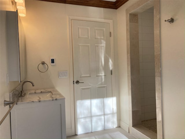 1626 Mogul Dr Unit 1626, Mohegan Lake, NY 10547 - full bath with vanity, a tile shower, and ornamental molding