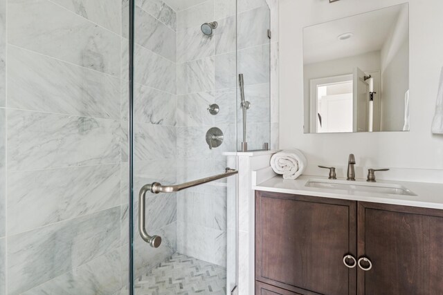 355 Dune Rd, Westhampton Beach, NY 11978 - bathroom featuring a stall shower and vanity