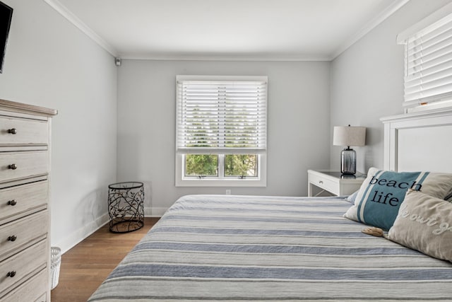 355 Dune Rd, Westhampton Beach, NY 11978 - bedroom featuring wood finished floors and ornamental molding