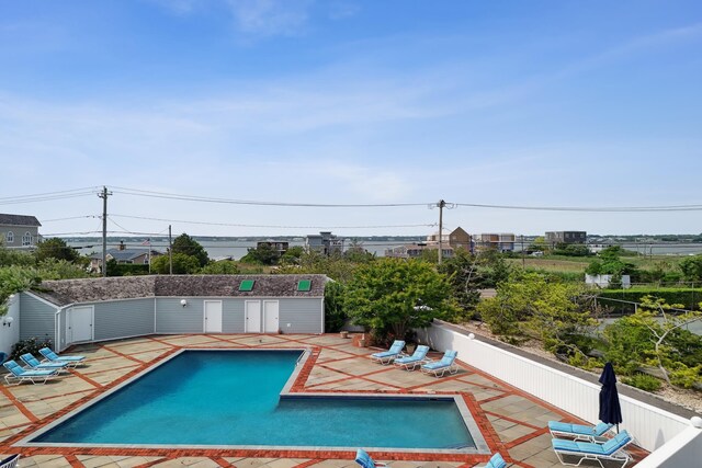 355 Dune Rd, Westhampton Beach, NY 11978 - view of swimming pool with a patio area