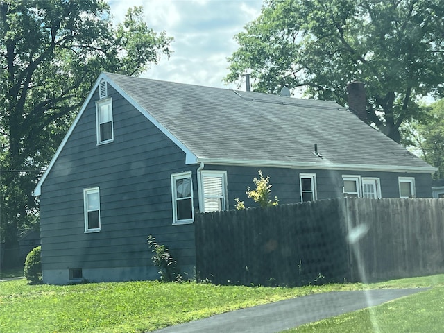 149 Wilkes St, Beacon, NY 12508 - view of property exterior with a chimney and a shingled roof