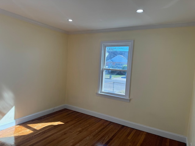 110 Terrace Ave, Elmont, NY 11003 - spare room featuring dark wood finished floors, baseboards, ornamental molding, and recessed lighting
