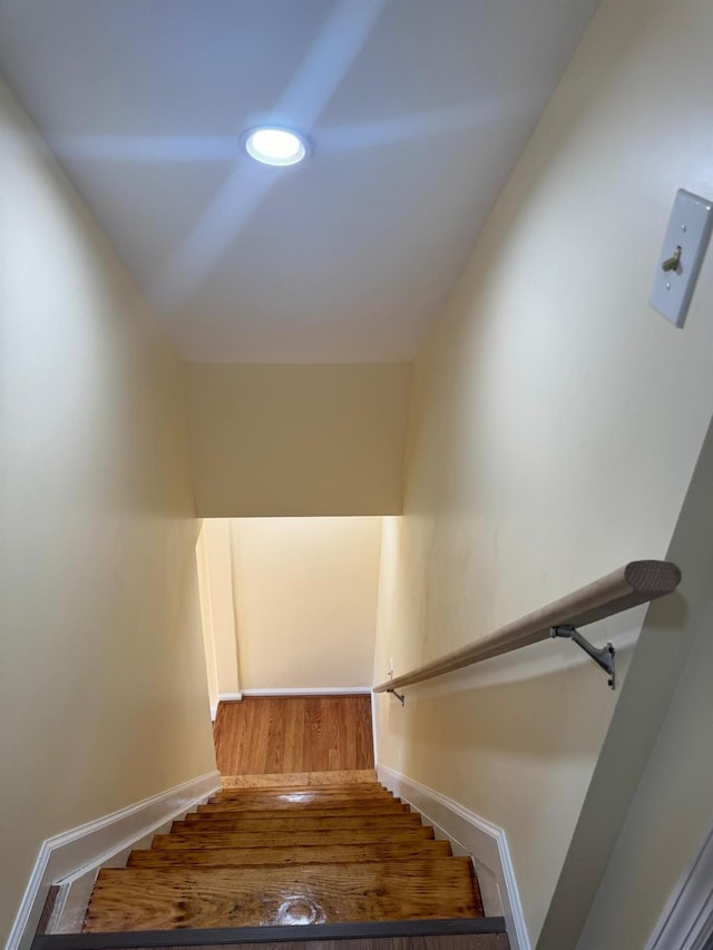 110 Terrace Ave, Elmont, NY 11003 - staircase featuring baseboards and wood finished floors