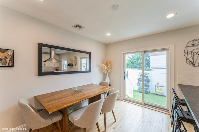 32 Henderson Ave, Port Washington, NY 11050 - dining space with light wood-type flooring and recessed lighting