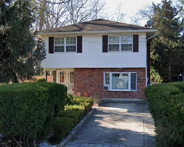 22 Landscape Dr, Wheatley Heights, NY 11798 - view of front of home featuring brick siding