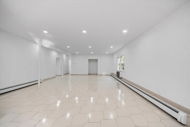 10 Mohawk Rd, Yonkers, NY 10710 - spare room featuring a baseboard radiator and recessed lighting