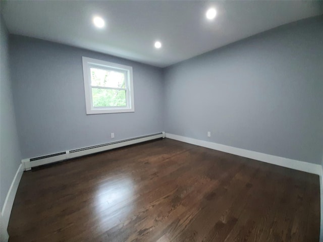 495 Stanton Ter, Poughkeepsie, NY 12603 - empty room featuring baseboard heating, dark wood-style floors, baseboards, and recessed lighting