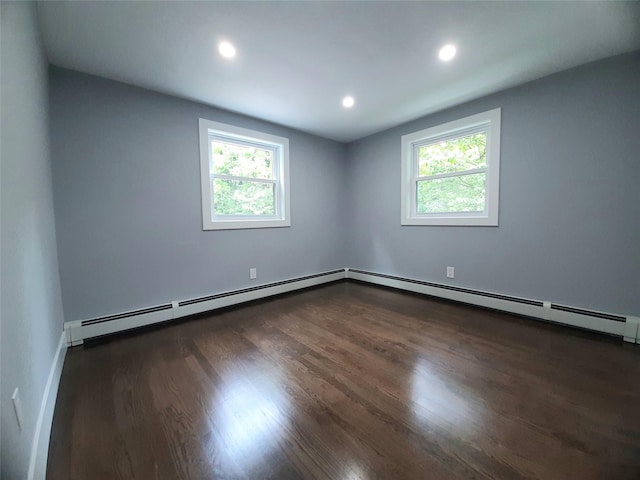 495 Stanton Ter, Poughkeepsie, NY 12603 - empty room with healthy amount of natural light, dark wood finished floors, recessed lighting, and baseboards