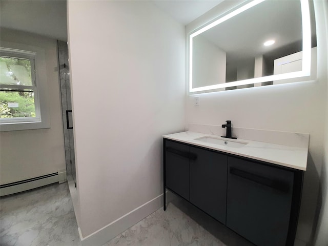 495 Stanton Ter, Poughkeepsie, NY 12603 - bathroom featuring vanity, marble finish floors, a baseboard heating unit, baseboards, and a stall shower