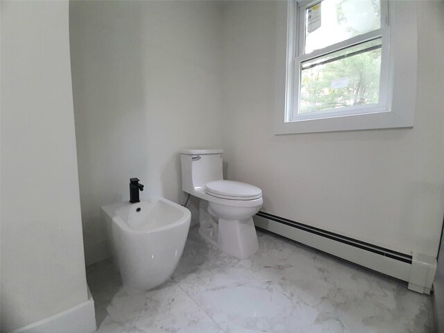 495 Stanton Ter, Poughkeepsie, NY 12603 - bathroom with baseboard heating, toilet, a bidet, marble finish floors, and baseboards