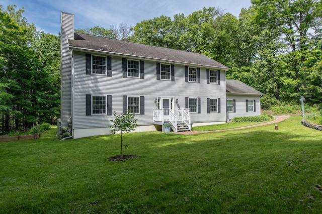 36 Valkill Dr, Poughkeepsie, NY 12601 - view of front of home with a chimney and a front lawn