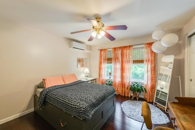 36 Valkill Dr, Poughkeepsie, NY 12601 - bedroom with a wall unit AC, dark wood-type flooring, a ceiling fan, and baseboards