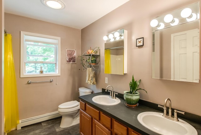 36 Valkill Dr, Poughkeepsie, NY 12601 - bathroom featuring a baseboard radiator, toilet, double vanity, and curtained shower
