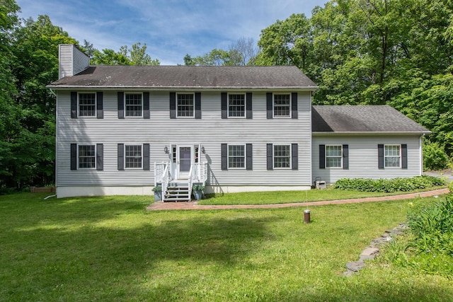 36 Valkill Dr, Poughkeepsie, NY 12601 - colonial inspired home featuring a chimney and a front lawn
