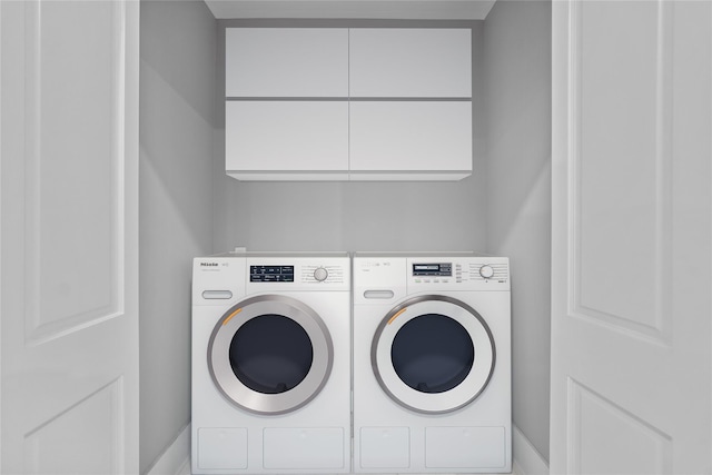 3 Hageman Ct, Katonah, NY 10536 - laundry room with washer and dryer, cabinet space, and baseboards