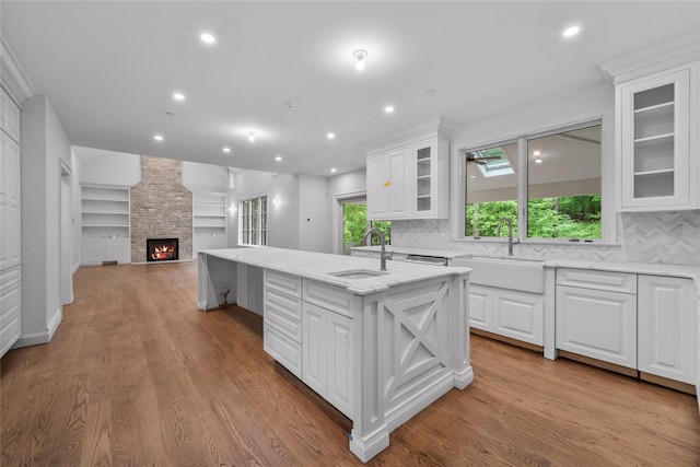 3 Hageman Ct, Katonah, NY 10536 - kitchen with a sink, white cabinets, and recessed lighting