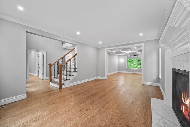 3 Hageman Ct, Katonah, NY 10536 - unfurnished living room featuring a fireplace with flush hearth, stairway, a wall mounted AC, light wood-style floors, and recessed lighting