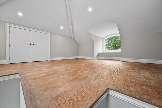 3 Hageman Ct, Katonah, NY 10536 - bonus room featuring lofted ceiling, baseboards, recessed lighting, and wood finished floors