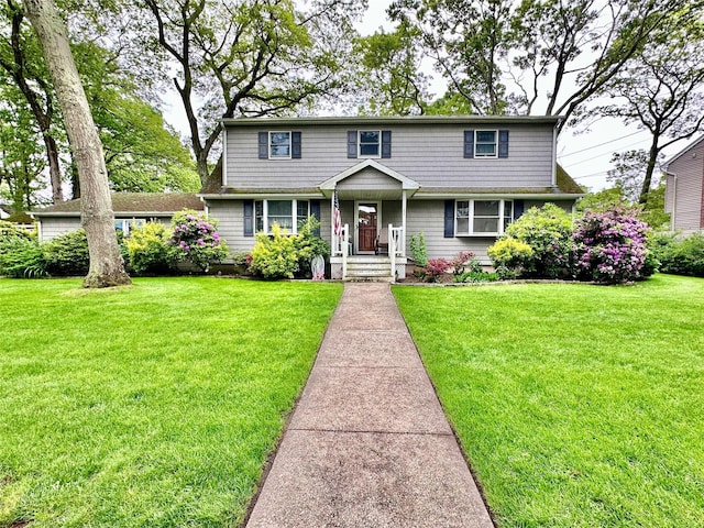 1134 Jefferson Ave, West Islip, NY 11795 - view of front of property featuring a front yard