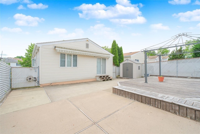 63 Dorval Ave, Staten Island, NY 10312 - back of property featuring a gazebo, a wooden deck, a patio area, and entry steps