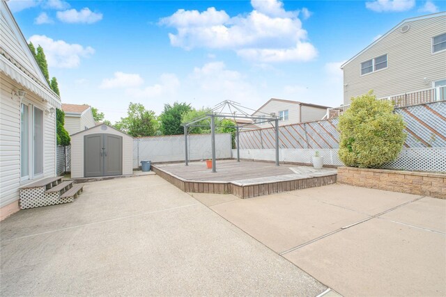 63 Dorval Ave, Staten Island, NY 10312 - fenced backyard featuring a gazebo, a patio, and a wooden deck