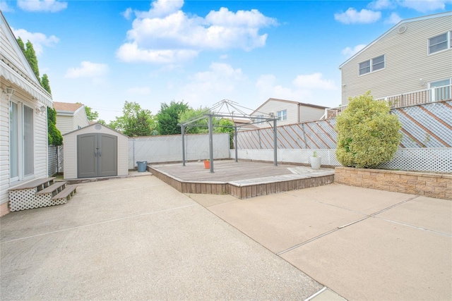 63 Dorval Ave, Staten Island, NY 10312 - fenced backyard featuring a gazebo, a patio area, and a deck