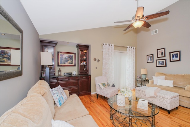 63 Dorval Ave, Staten Island, NY 10312 - living room featuring light wood-type flooring, high vaulted ceiling, and ceiling fan