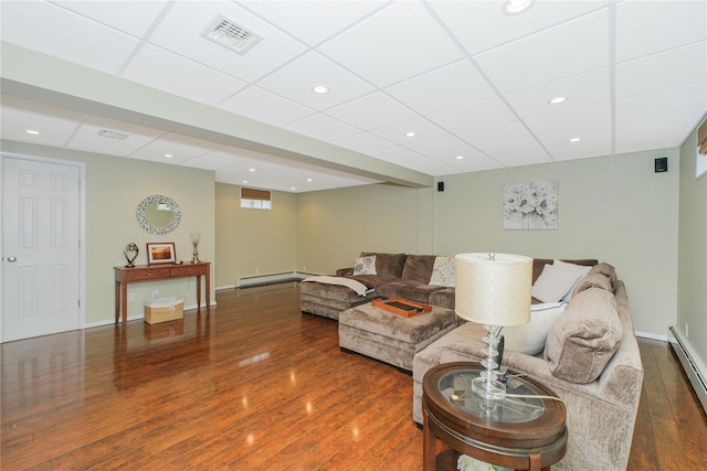 63 Dorval Ave, Staten Island, NY 10312 - living area with a paneled ceiling, wood finished floors, a baseboard radiator, recessed lighting, and baseboard heating