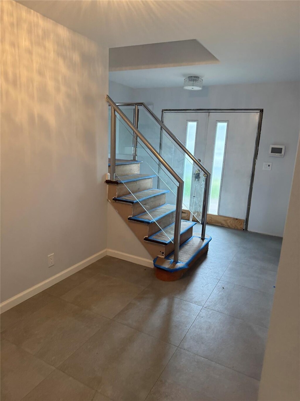 3116 Monterey Dr, Merrick, NY 11566 - staircase with baseboards