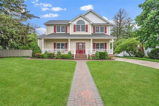10 Stewart St, East Islip, NY 11730 - view of front facade with a porch