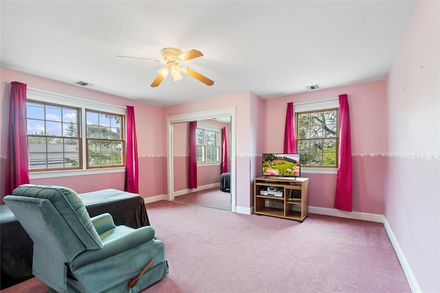 10 Stewart St, East Islip, NY 11730 - sitting room with a ceiling fan, carpet floors, and baseboards