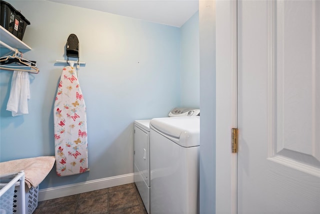 10 Stewart St, East Islip, NY 11730 - laundry area featuring washer and dryer and baseboards