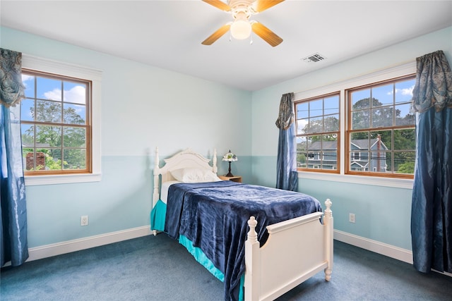 10 Stewart St, East Islip, NY 11730 - carpeted bedroom with baseboards and a ceiling fan