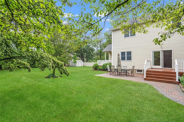 10 Stewart St, East Islip, NY 11730 - view of green lawn featuring a patio area