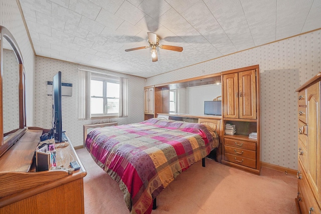 60-51 71st St, Maspeth, NY 11378 - bedroom with wallpapered walls, light carpet, a ceiling fan, baseboards, and crown molding