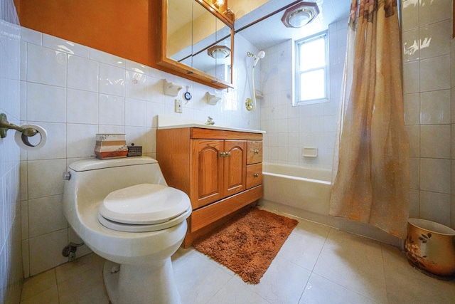 60-51 71st St, Maspeth, NY 11378 - full bath with tile walls, vanity, tile patterned flooring, shower / tub combo, and toilet