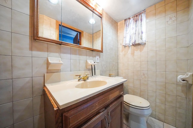 60-51 71st St, Maspeth, NY 11378 - bathroom featuring tile walls, vanity, and toilet