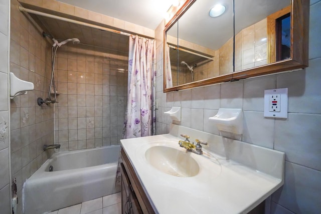 60-51 71st St, Maspeth, NY 11378 - bathroom featuring tile walls, shower / bath combo with shower curtain, vanity, and tile patterned flooring