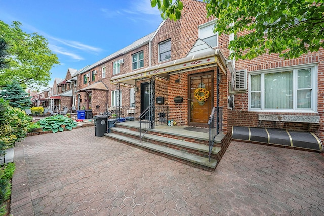 60-51 71st St, Maspeth, NY 11378 - view of front of property featuring brick siding and a residential view