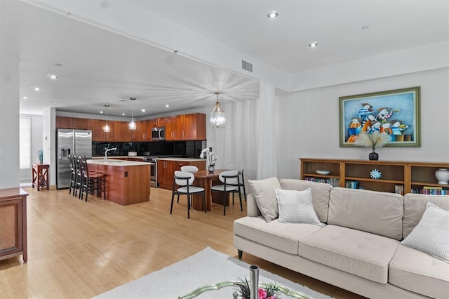 45 Main St Unit 3K, Hastings-On-Hudson, NY 10706 - living area with light wood-type flooring and recessed lighting