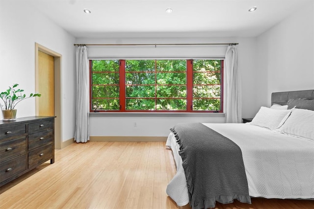 45 Main St Unit 3K, Hastings-On-Hudson, NY 10706 - bedroom featuring multiple windows, light wood-style flooring, recessed lighting, and baseboards