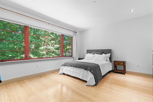 45 Main St Unit 3K, Hastings-On-Hudson, NY 10706 - bedroom with wood finished floors, recessed lighting, and baseboards