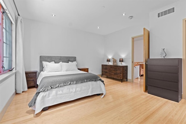 45 Main St Unit 3K, Hastings-On-Hudson, NY 10706 - bedroom with light wood-style floors, recessed lighting, and baseboards