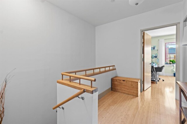 45 Main St Unit 3K, Hastings-On-Hudson, NY 10706 - hall with light wood-type flooring, a desk, and baseboards