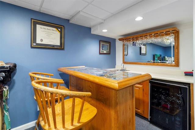8 Knoll Vw, Ossining, NY 10562 - indoor wet bar with wine cooler, recessed lighting, baseboards, carpet flooring, and a drop ceiling