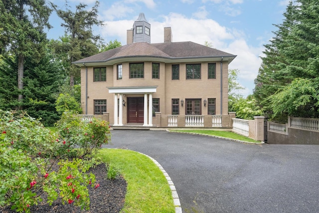 30A Shelter Rock Rd, Manhasset, NY 11030 - view of front of house featuring a chimney