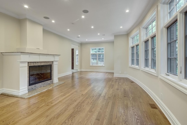 30A Shelter Rock Rd, Manhasset, NY 11030 - unfurnished living room with crown molding, light wood-style flooring, a premium fireplace, recessed lighting, and baseboards