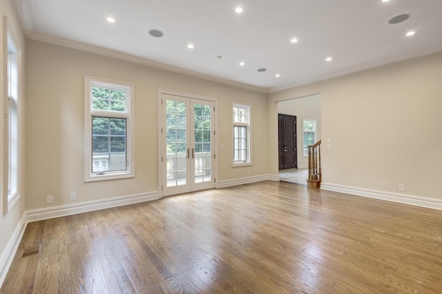 30A Shelter Rock Rd, Manhasset, NY 11030 - empty room featuring french doors, light wood finished floors, crown molding, baseboards, and recessed lighting