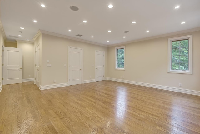 30A Shelter Rock Rd, Manhasset, NY 11030 - empty room featuring ornamental molding, healthy amount of natural light, light wood finished floors, baseboards, and recessed lighting