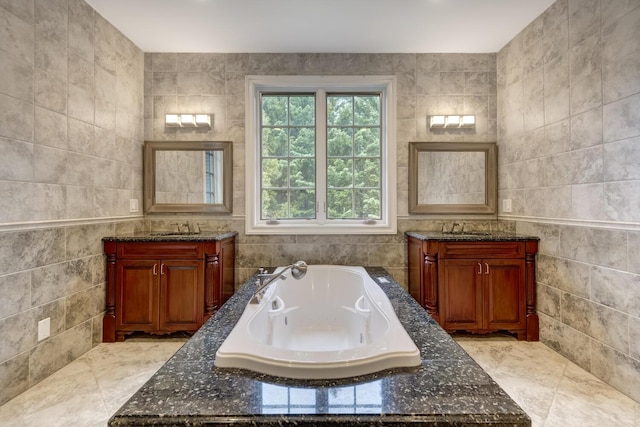 30A Shelter Rock Rd, Manhasset, NY 11030 - bathroom featuring tile walls, two vanities, and a tub with jets